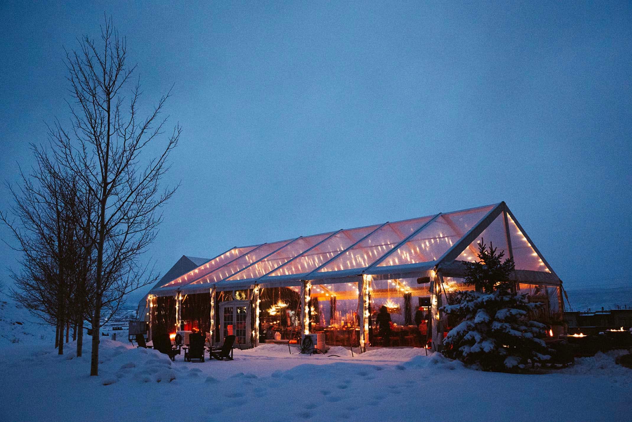 Illuminated winter event pavilion prepared for luxury destination kosher catering