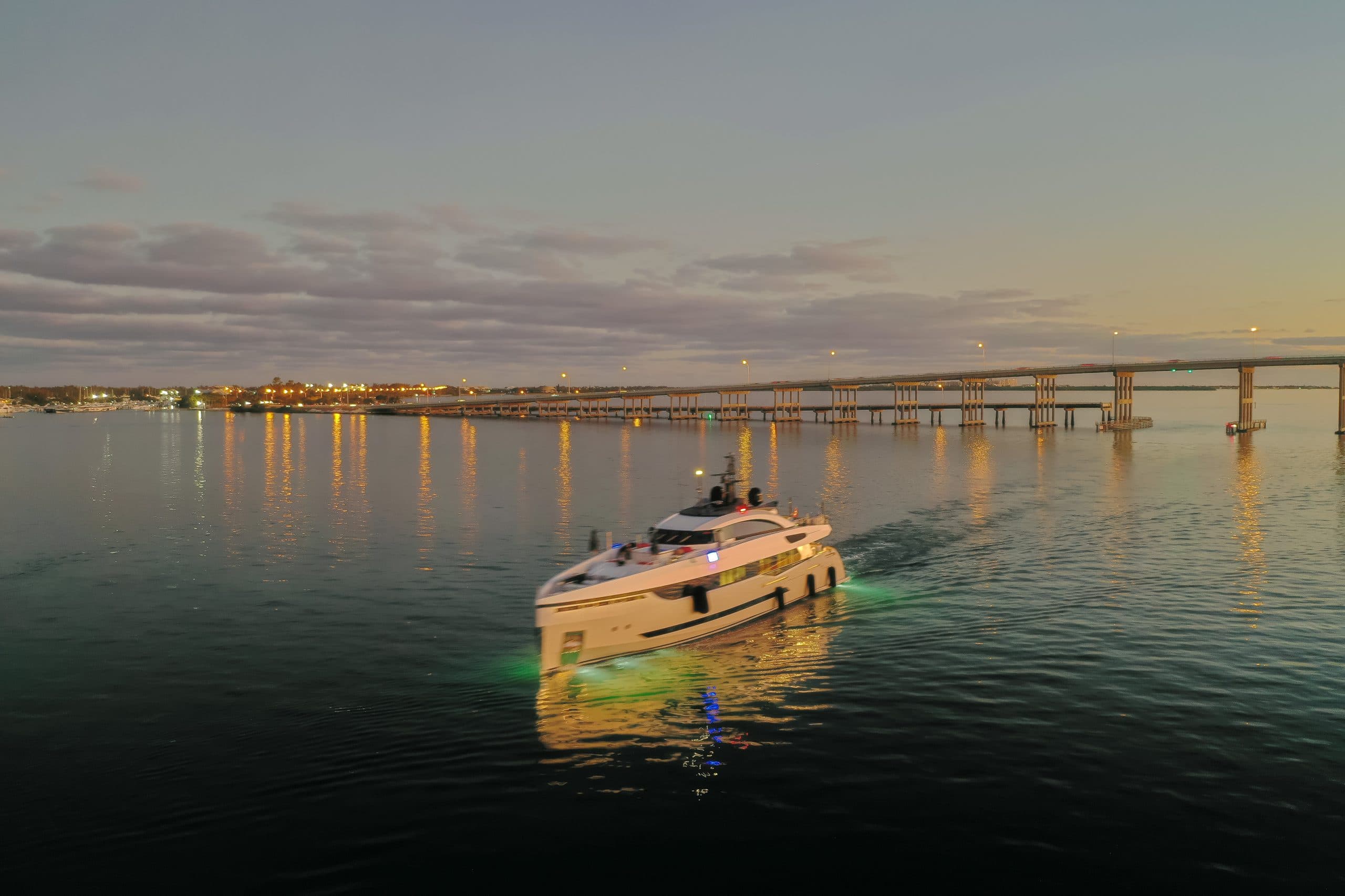 Luxury private yacht cruising at dusk for a bespoke kosher charter