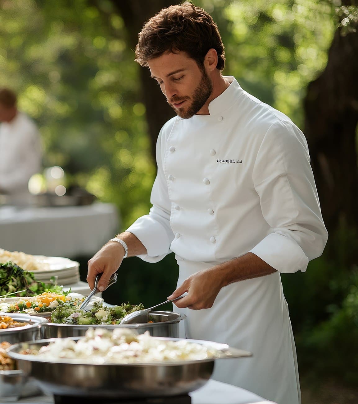 Kosher private chef preparing an elegant catered meal outdoors